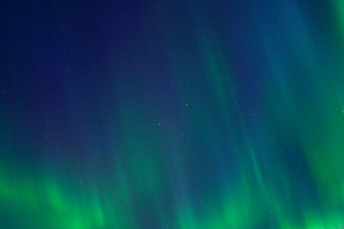 4 Hour Aurora Tour Photos Snacks and Warm Drinks Included - Thermal suits, hot chocolate, and the onboard toilet
