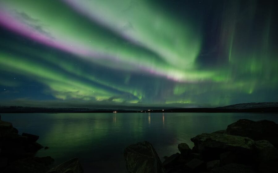 Abisko: Guided Autumn Aurora Chase with Hotel Transfers - Björkliden and Bear Mountain viewpoints