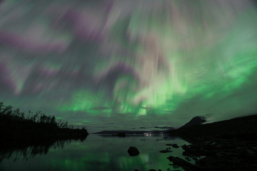 Abisko: Guided Autumn Aurora Chase with Hotel Transfers - Fire, shelter, and the hot drink