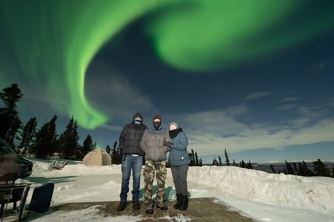 Aurora Chasing Tour With Free Photography Service - A small group, with a guide at the center