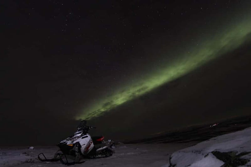 Aurora Hunt on Snowmobile - small groups - Riding through frozen lakes and quiet forests
