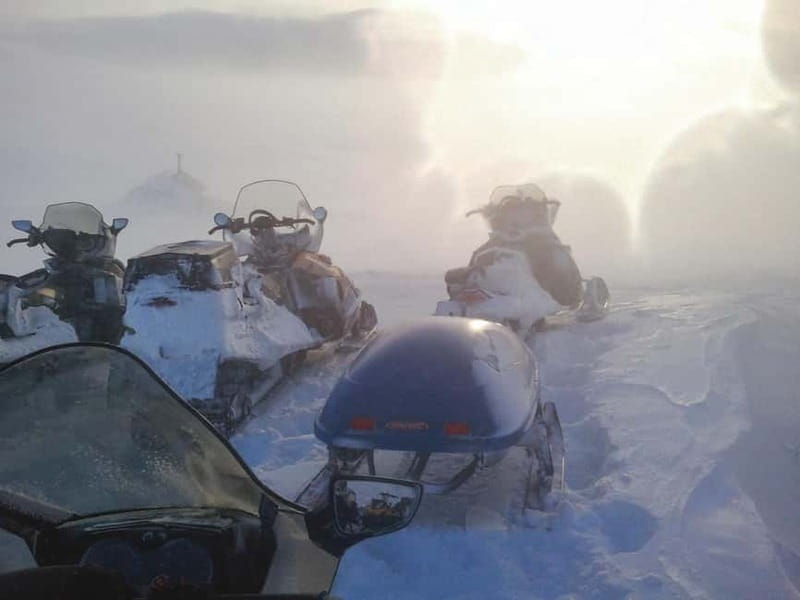 Aurora Hunt on Snowmobile - small groups - Warm clothing that takes the edge off winter