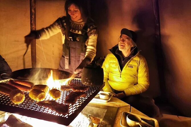 Enjoy the Aurora show on top of the mountain inc tipi dinner - Riding a snowmobile through the dark