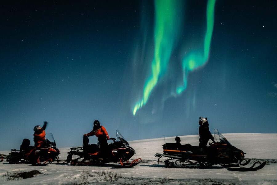 From Alta: Northern Lights Night Adventure By Snowmobile - Learning to handle a snowmobile in the dark