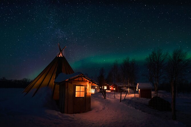 From Kakslauttanen:Northern Lights tour to Lake Inari, inc dinner - Dinner beside an open fire in a Lappish teepee
