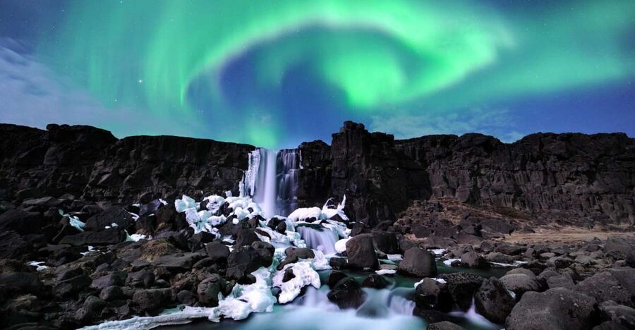 From Reykjavik: Golden Circle and Northern Lights Combo - Geysir and Strokkur: the reliable burst of steam