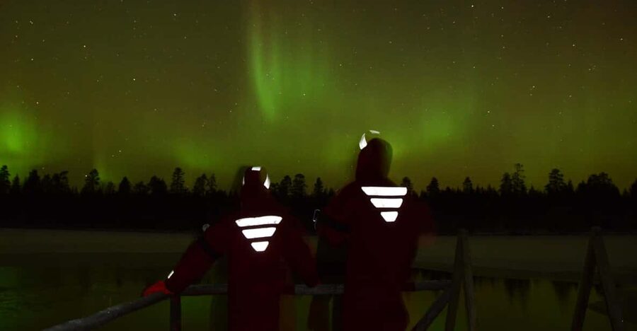 From Rovaniemi: Ice Floating under Aurora Borealis - Getting into the water without swimming