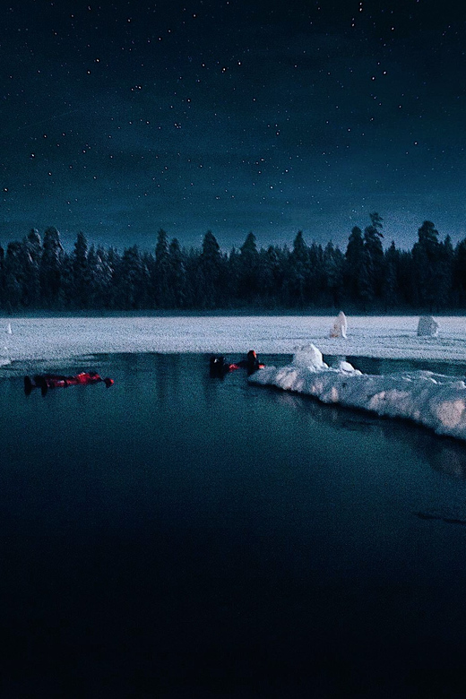From Rovaniemi: Ice Floating under Aurora Borealis - Two groups, warm drinks, and a Finnish tent