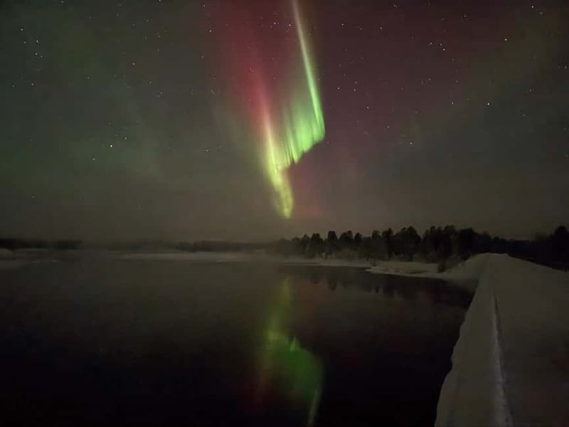 From Saariselkä/Inari: Aurora Hunting Tour, campfire&snacks - The campfire stop: sausages, berry juice, and sweet buns