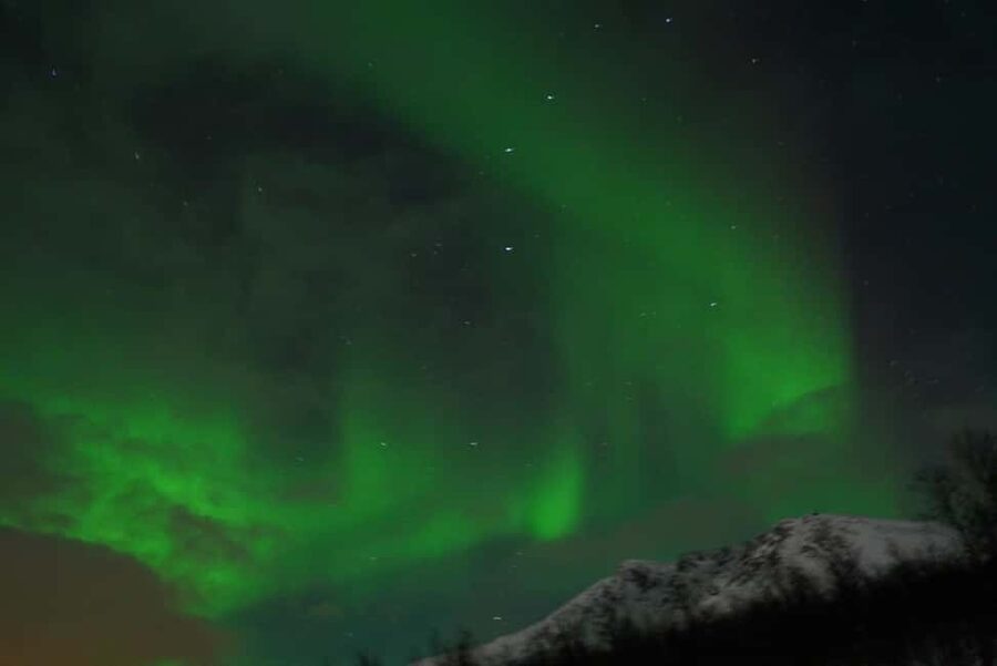 From Tromsø: Aurora Bus Tour with Snacks, Photos, and Drinks - Chasing clear skies beyond Tromsø