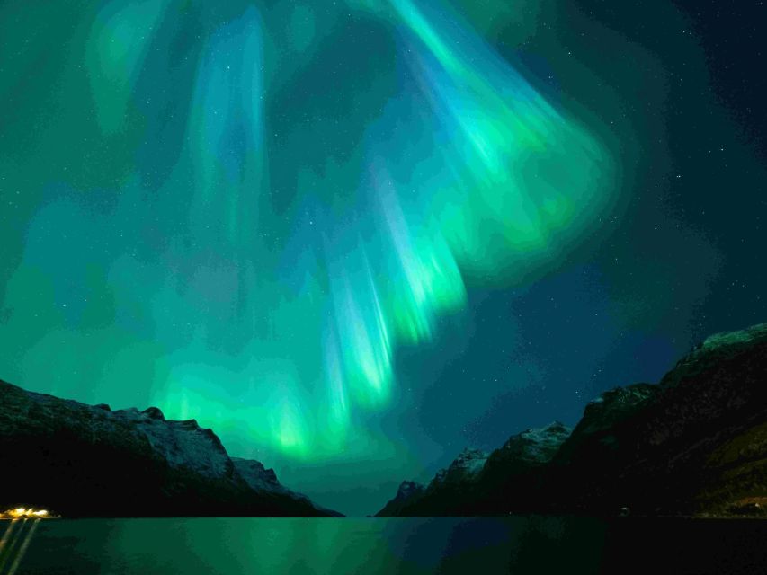 From Tromsø: Northern Lights Cruise on a Cozy Vintage Vessel - Staying warm without missing the view