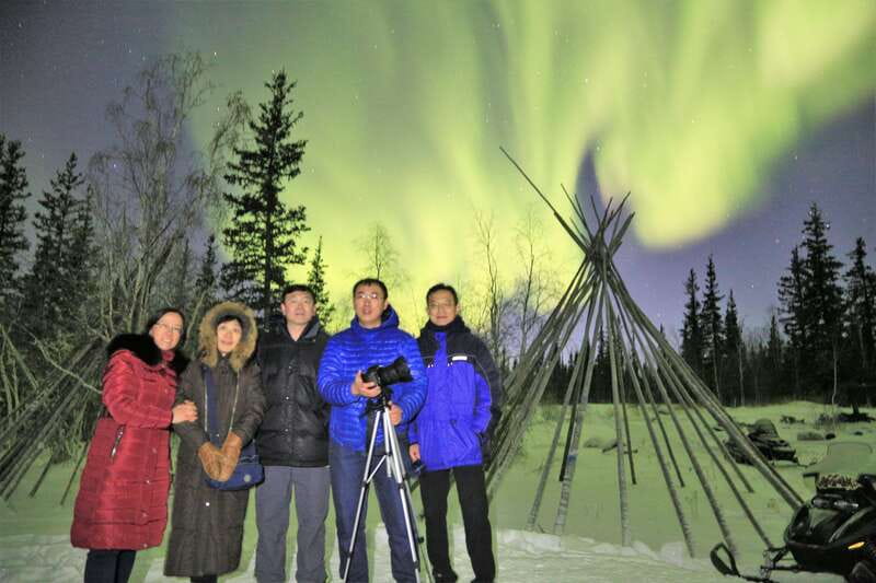 From Yellowknife: Northern Lights Bus Tour with Photos - Three stops, with room to chase better conditions