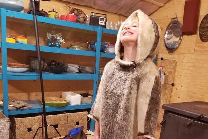 Intimate Aurora Tours Cozy Cabin Bucket List - Fur coats, fire, and photos