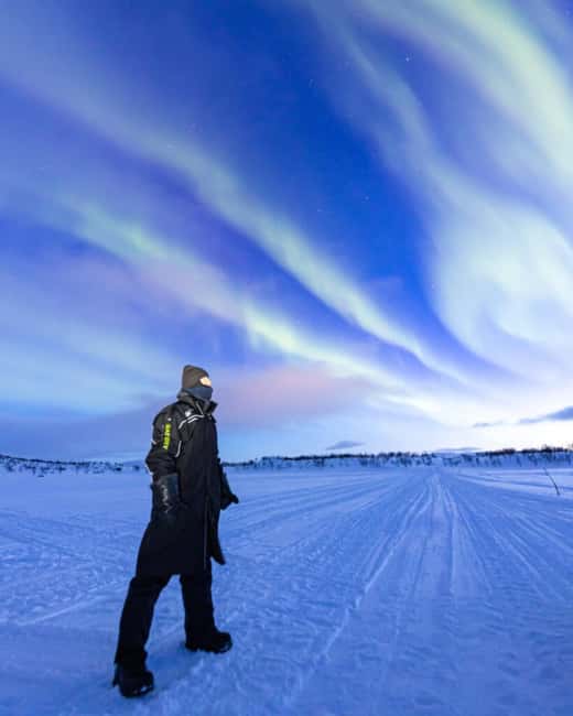 Kilpisjärvi: Northern Lights Snowmobile Tour with Photos - Timing, meeting point, and border details