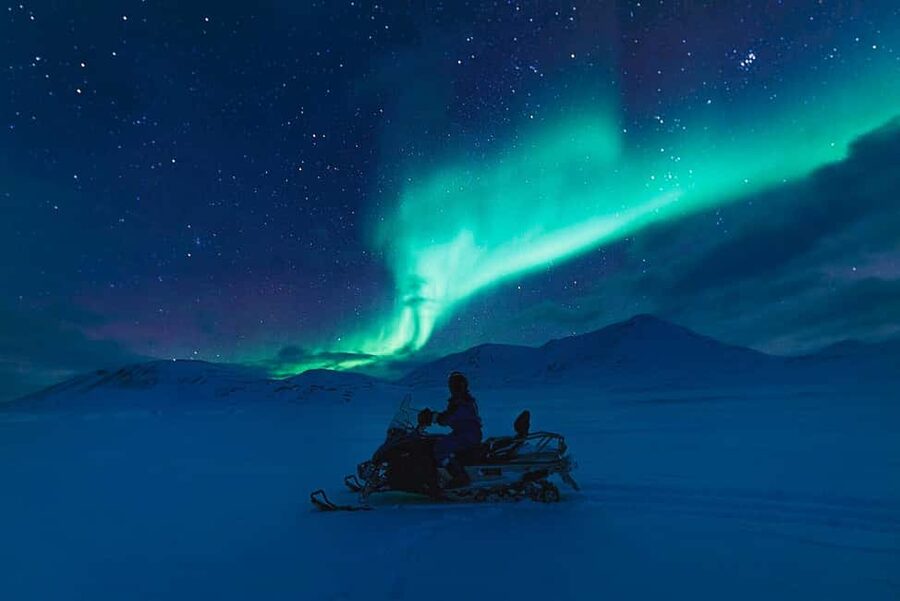 Kiruna: Northern Lights Snowmobile Tour - Riding into the Arctic night near Kiruna
