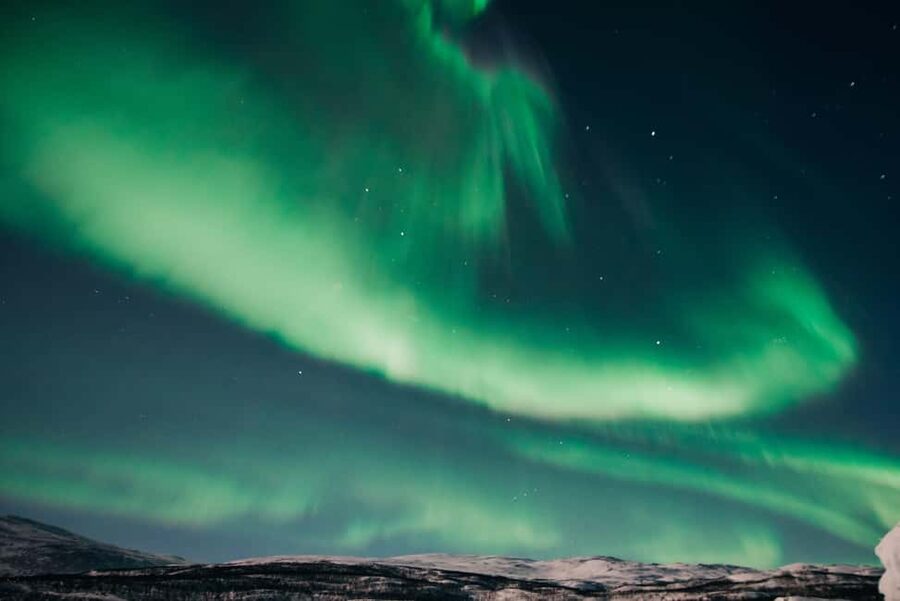Kiruna: Northern Lights Snowmobile Tour - Pickup from Kiruna hotels and the ride to Poikkijärvi