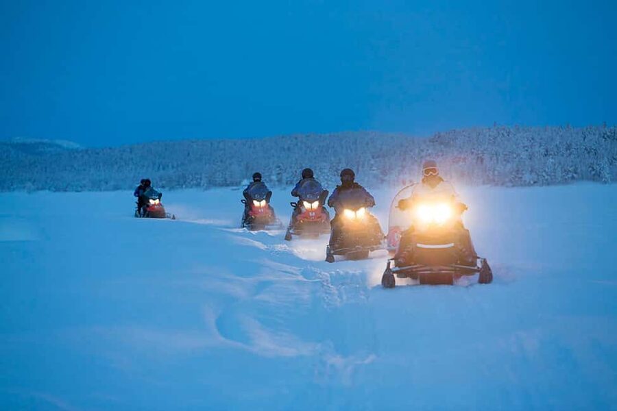 Kiruna: Northern Lights Snowmobile Tour with Dinner - What happens from pickup to the first ride
