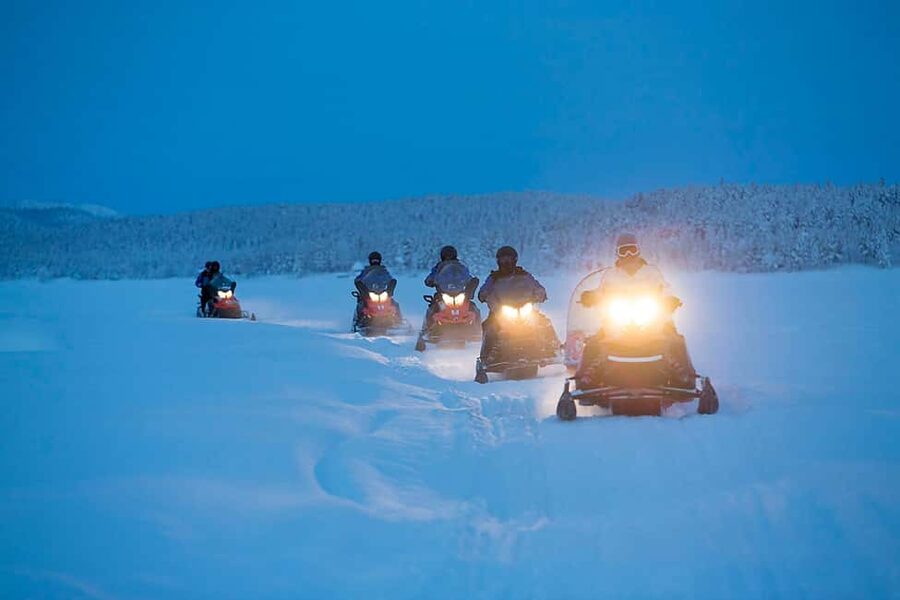 Kiruna: Northern Lights Snowmobile Tour with Transfer - Riding into Kiruna’s dark winter forest