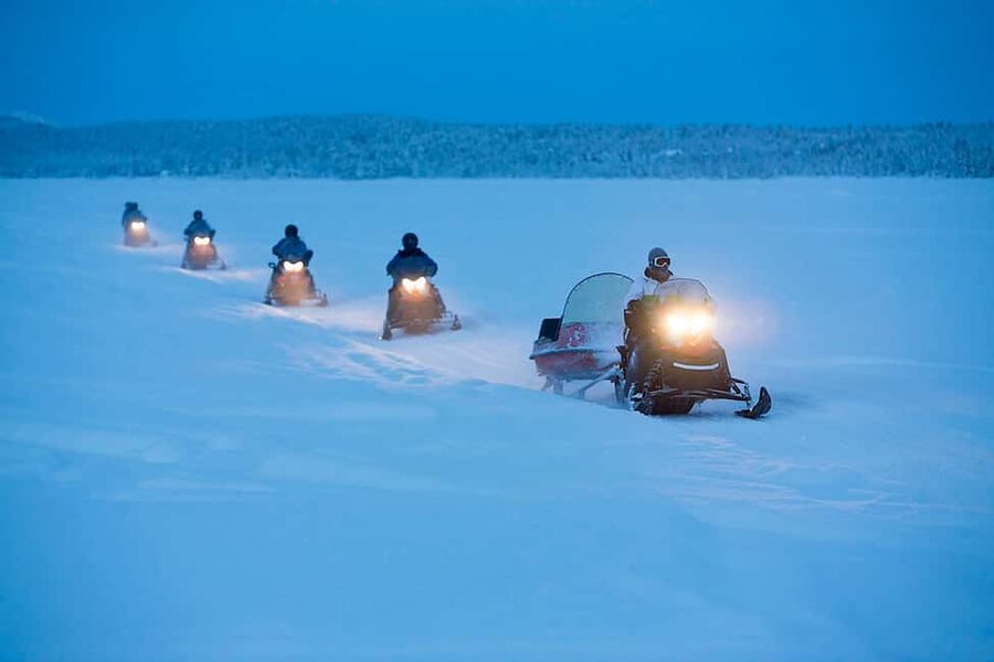 Kiruna: Northern Lights Snowmobile Tour with Transfer - Getting ready with warm gear and clear instructions