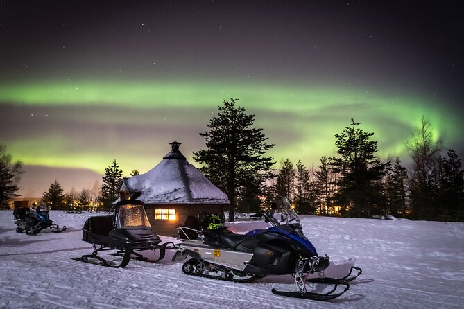 Levi Northern lights by snowmobile - A moonlit ride into the Lappish wilderness