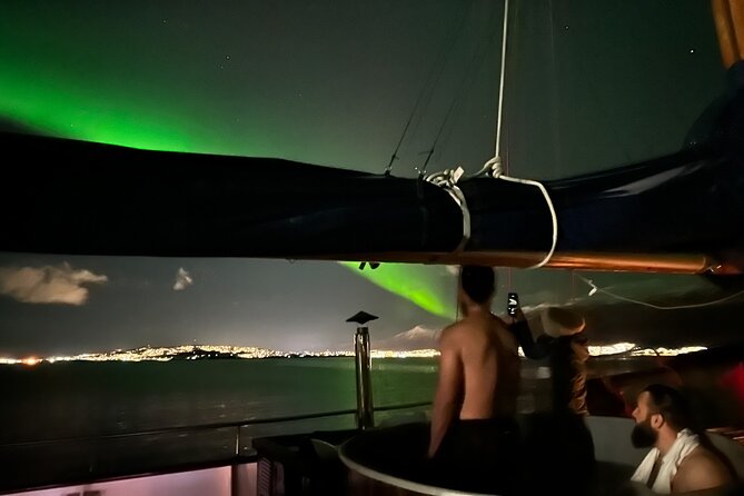 Luxury Northern Lights Yacht Cruise with Hot Tub from Tromsø - Captain Kenneth and Sachi set the tone