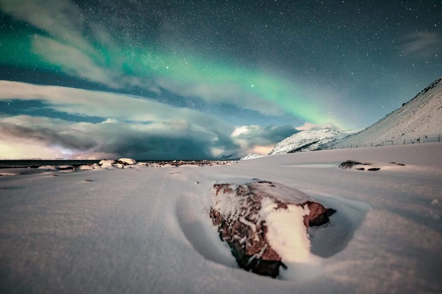 Lyngenalps: Northern Lights Snowmobile Safari - Following the guide into the snowy mountains