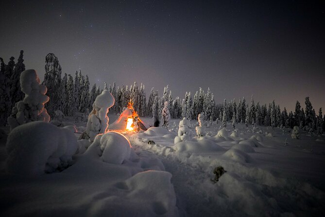 Night Snowshoeing Adventure under the Northern Lights - The fire, Finnish snack, and warm-up stop