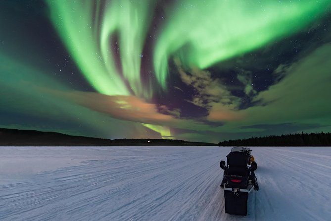 Northern Lights Hunting with Snowmobiles - Snowmobiling gives the aurora hunt a real purpose