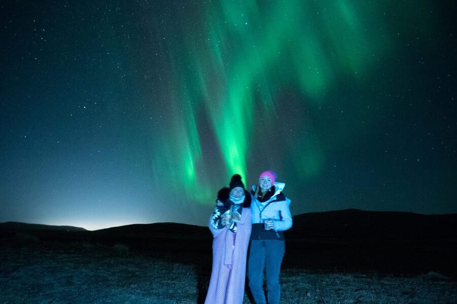 Northern Lights in Mini Bus, Photos, Hot Cocoa and Pastries - Leaving Reykjavik behind for a darker sky