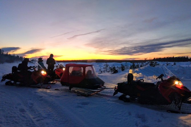 Northern Lights Night by Snowmobile (private tour) - Setting off through snowy forest and across lakes