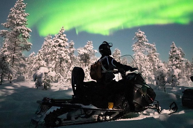Northern lights safari by snowmobile - The Northern Lights: a hopeful search, not a promise