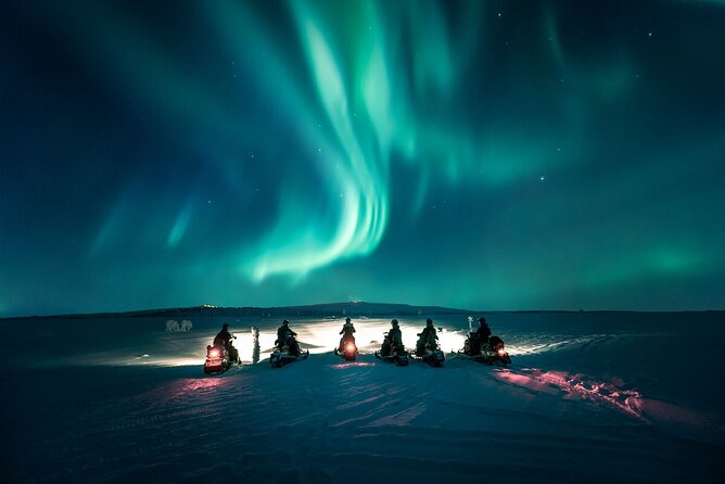 Northern Lights Snowmobile Safari from Rovaniemi with Campfire Picnic - Searching the sky for the Northern Lights