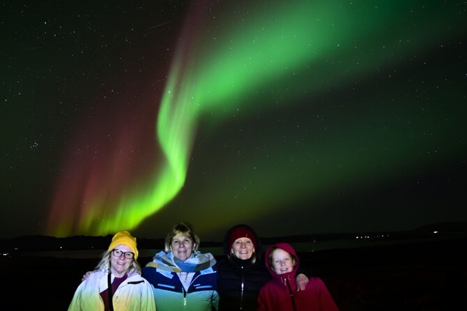 Northern Lights Tour: Cozy Night Adventure with Hot Chocolate - Guide stories add meaning to the waiting