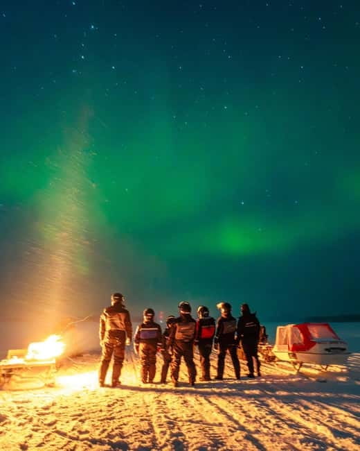 Northern Lights Tour Sleigh Ride - Settling Onto Reindeer Pelts
