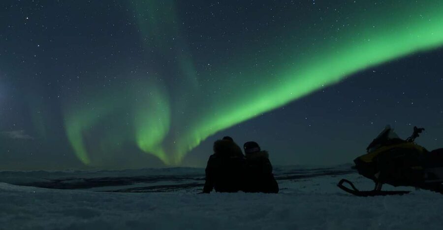 Premium Aurora Snowmobile Ride With Panoramic Views - Getting dressed for Kiruna after dark
