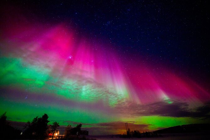 Private Group: Northern Lights Hunt 4x4 SUV with Aurora guarantee - Waiting beside a frozen lake or river