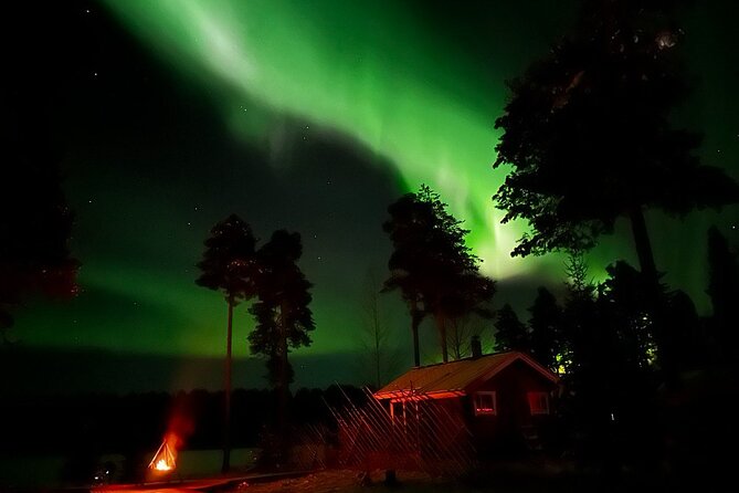 Private Northern Lights Expedition by Lapland's Experienced Team - Finnish sausages and glögi by the fire
