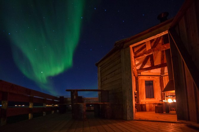 Reindeer Camp Dinner with Chance of Northern Lights in Tromso - Inside the lavuu by the fire