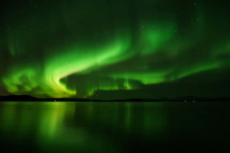 Reykjavik: Northern Lights Adventure Tour with Hot Chocolate - Driving away from the city lights