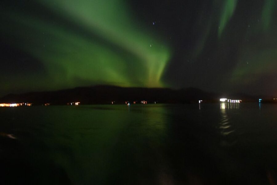 Reykjavik: Northern Lights Guided Boat Tour - Why the ocean setting changes the experience