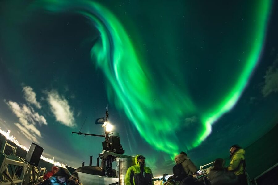 Reykjavik: Northern Lights Guided Boat Tour with Photos - What the boat ride feels like