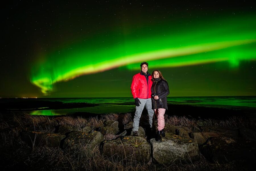 Reykjavik: Northern Lights Tour with Private Photographer - Pickup details and what to pack