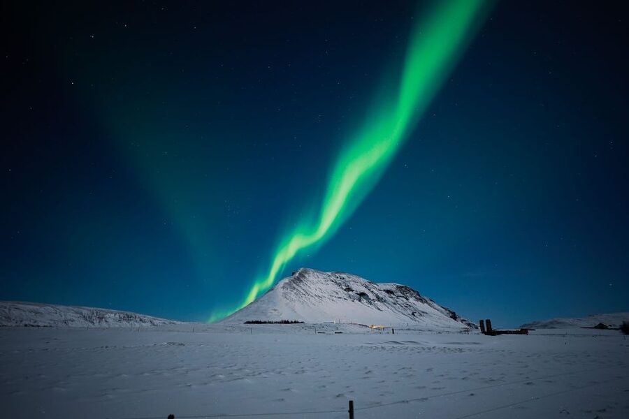 Reykjavik: Northern Lights Tour with Private Photographer - Icelandic snacks around the camera tripod