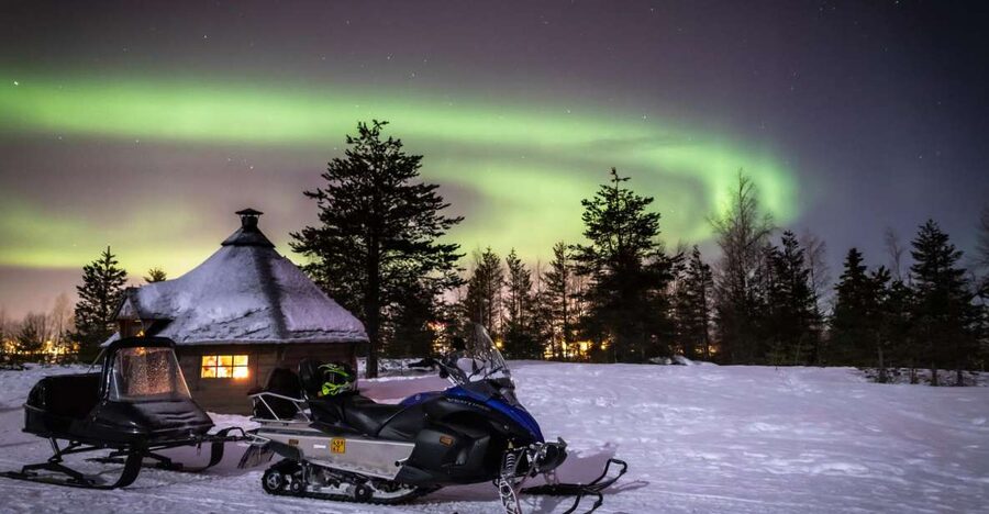 Rovaniemi: Aurora Borealis Snowmobile Safari with Campfire - Warming up beside the campfire