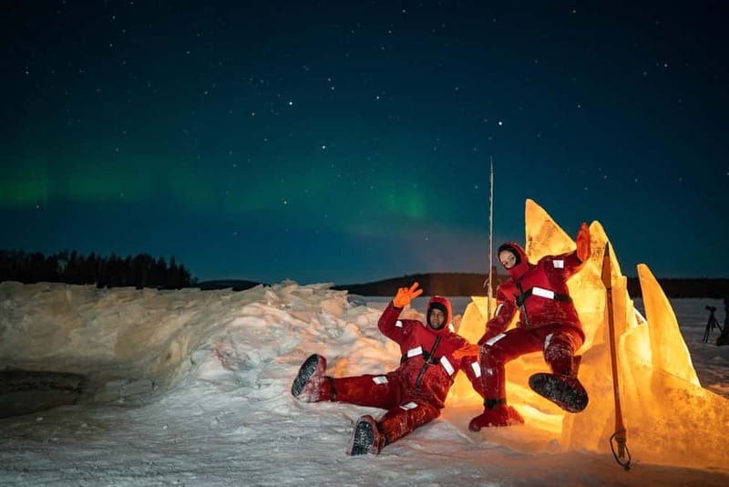 Rovaniemi: Ice Floating in Forest Lake with Aurora Borealis - Getting into the survival suit