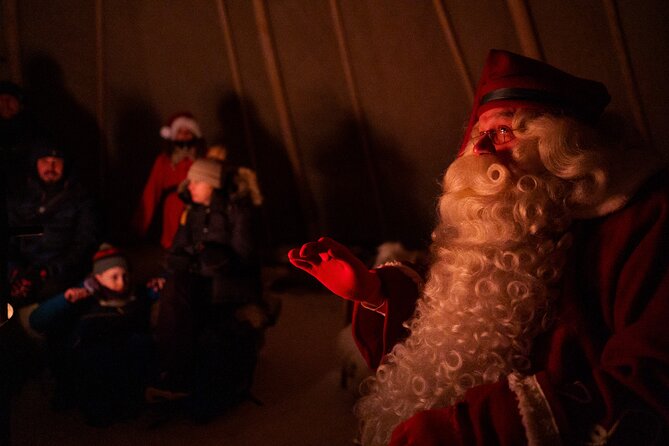 Rovaniemi: Meet Santa Claus & Northern Lights Experience - A snowy Santa evening beyond central Rovaniemi