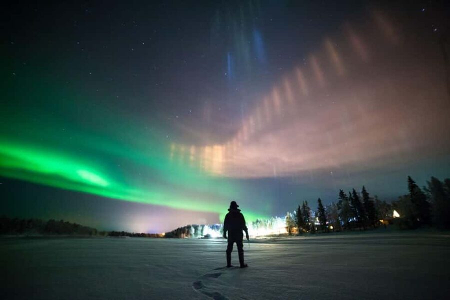 Rovaniemi: Northern Lights Hunt with Sausages and Hot Drinks - Waiting beside the fire in Finnish Lapland