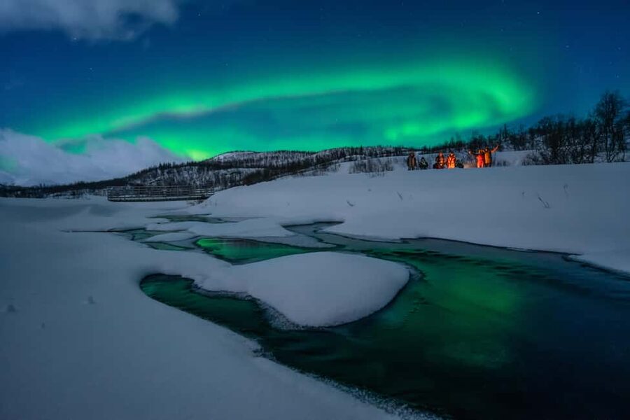 Tromsø: A Sámi Survival Story and Aurora Hunt - Leaving the city in a heated minivan