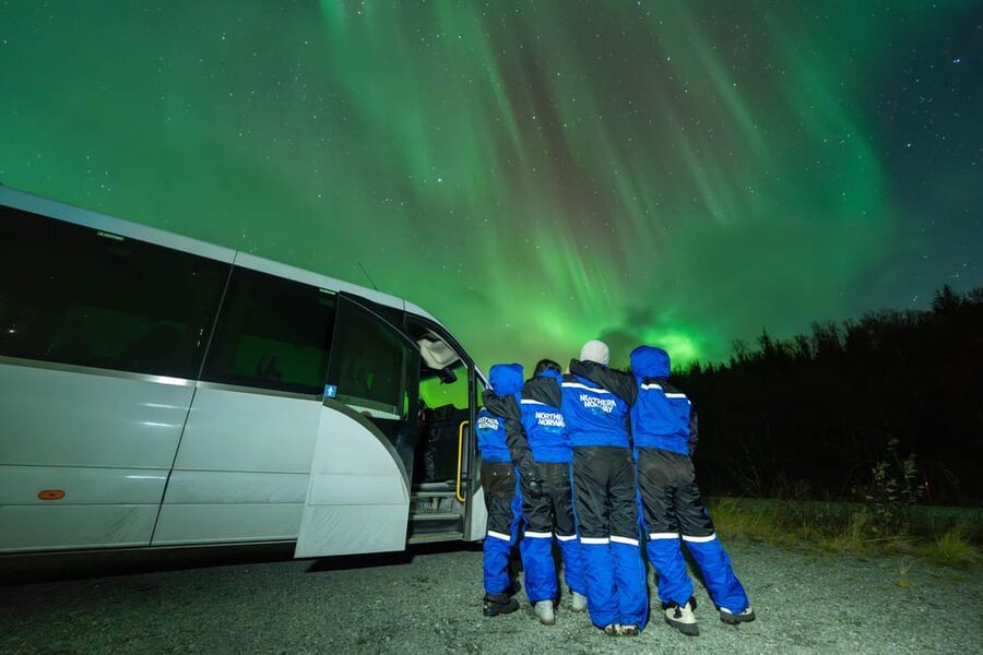 Tromsø: Aurora Borealis, Campfire, Hot Meal, Arctic Tour - Finding a gap in the clouds