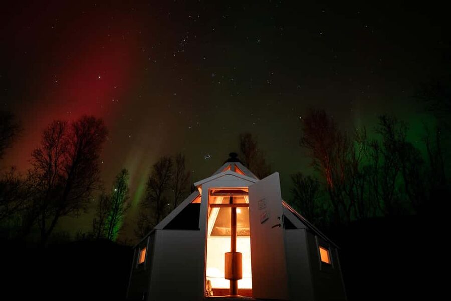 Tromsø: Aurora Crystal Lavvo Experience with Snowshoeing - The crystal lavvo and the wood stove